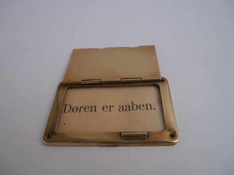 "Døren er aaben (The door is open)" sign in brass, Denmark approx. 1920.