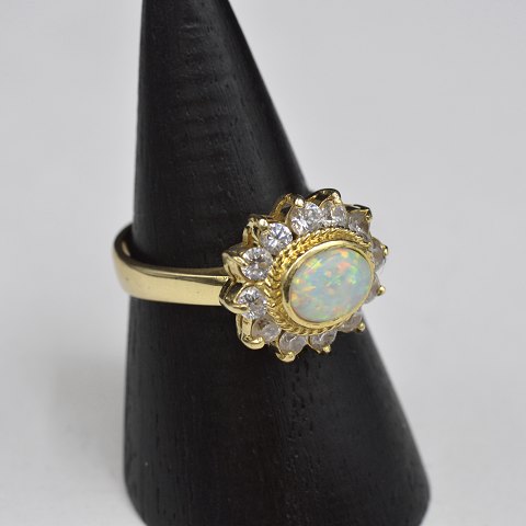 18k guldring m. opal og kvarts. Str. 58½