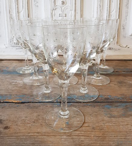 Set of 12 white wine glasses decorated with guilloche