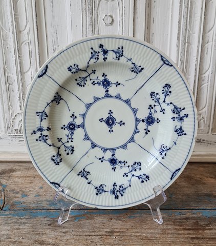 Royal Copenhagen Antique Blue Fluted plate ca year 1800.
Diameter 24 cm. 
Appears with chip.