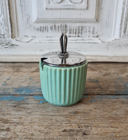 Michael Andersen fluted jam jar with very beautiful turquoise glaze. Silver 
plated lid made by Huggo Grün