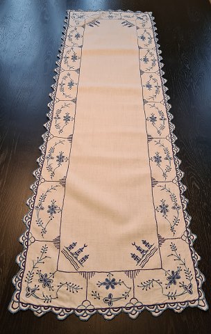 Table runs embroidered with blue fluted pattern Measures 37.5 x 116 cm.