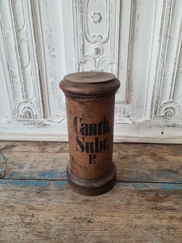 Old wooden pharmacy jar