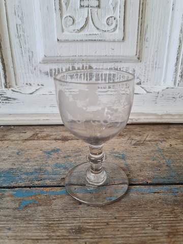 19th century Danish wine glass on stem with button, decorated with matte cut 
vine with 3 bunches of grapes
