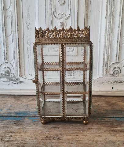 Rare large antique French glass and gilt metal jewelery box designed as a 
cupboard with three shelves