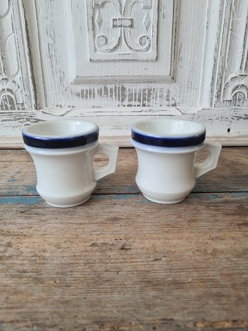 Pair of French café brûlot cups in strong iron porcelain decorated with blue 
stripes