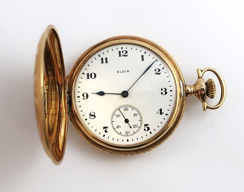 Elgin, USA. Taschenuhr aus mehrfarbigem Gold in 14K (585). Durchmesser 50 mm. 
Das Gehäuse hat einen kleinen Aufdruck bei 11 Uhr. Uhrwerk funktioniert.