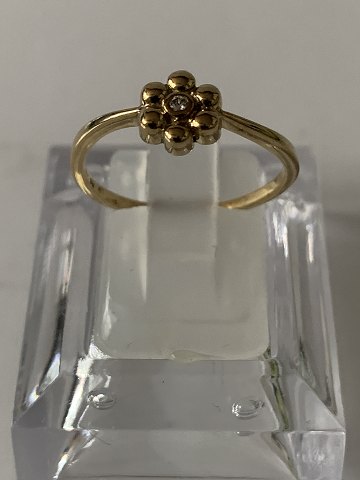 Gold ring in 8 carat gold, with white stone. The ring is stamped JAa 55, size 
55.