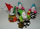 Four vintage pine cone gnomes