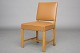 Danish cabinetmaker.
Chair.
Elm wood & leather.
Nice vintage condition.
Good, used condition
1 pc. in stock
