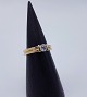 14k guldring m. brillant. Str. 57