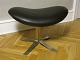 Corona footstool
Brushed steel and black leather 
Poul Volther