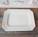 Aluminum edged dish in cream-colored faience. Dimensions 24.5 x 33 cm.