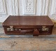 Small vintage suitcase in dark brown leather