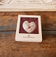 Royal Copenhagen Year heart decorated with purple mussel-painted decoration