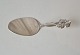 Silver serving spade decorated with flower from 1947