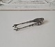 Sugar tongs in silver