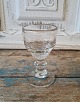 Wine glass with chalk-shaped basin and button on the stem - matt ground 
measuring unit 0.05L