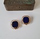 Vintage ear clip in 14 kt gold with blue stone