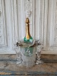 Champagne cooler in glass with gold-plated metal mounting with space for six 
glasses