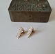 Pair of beautiful triangular vintage ear rings in 14 kt gold