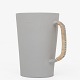 Metha Stuart Wallace / Own workshop
Handmade stoneware jug with grey glaze and braided handle with blue stripe. 
Series 
