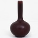 Axel Salto / Royal Copenhagen
High-necked vase in stoneware with oxblood glaze. Model 20667. Signed.
1 pc. in stock
Original condition
