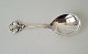 Serving spoon in silver beautifully decorated with flower
