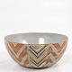 Eva Brandt
Stoneware bowl with line decor in earthy colours. Signed. Provenance: Ceramics 
collector Hans-Henrik Dyhr (1940-2023).
1 pc. in stock
Good condition
