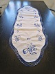 Table runner beautifully embroidered with blue flowers 48 x 135 cm.
