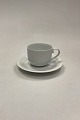 Royal Copenhagen White Magnolia with Embossed Bisque Flowers Coffee cup and 
saucer No. 72/73