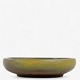 Nils Thorsson / Royal Copenhagen.
Lille skål i stentøj med Solfatara-glasur (model 20351). Stemplet fra 
producent.
1 pc. in stock

