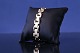 Blok gold bracelet with 3 rows and embossing, in 14 karat gold.
Length: 18.5 cm.