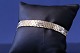 Brick gold bracelet with 9 rows, Stamped J.S, 585