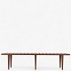 Hans J. Wegner / Johannes Hansen.
JH 574 - Bench in solid teak with tapered legs. Manufacturer