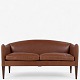 Illum Wikkelsø / Holger Christiansen.
Model V12 - Nybetrukket 2 pers. sofa i 