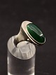 Sterling silver ring with cabochon cut green stone