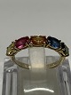 Silver ring with colored zircons plated with 18 karat gold
Size 56