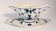 Royal Copenhagen. Blue fluted, plain. Sauce bowl. Model 202. Length 24.5 cm. (1 
quality). Produced before 1923