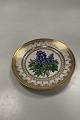 Royal Copenhagen Antik Tallerken med Blomster Motiv og guld. Signeret af Christian Klein fra 1820-1850