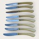Jens H. Quistgaard8 stk. Knive med lyse kunststofskafter*550 kr samlet