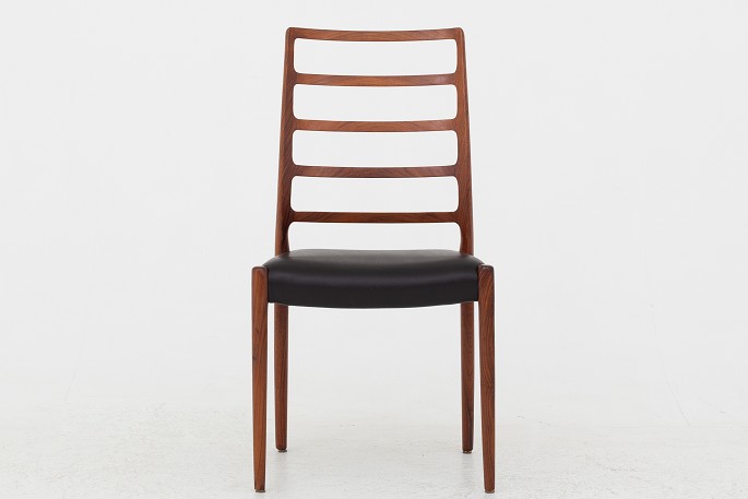 Niels O. Møller /  J. L. Møllers Møbelfabrik
NO 82 - Dining chair in rosewood w. new, black Palace leather.
Good, used condition
1 pc. in stock
