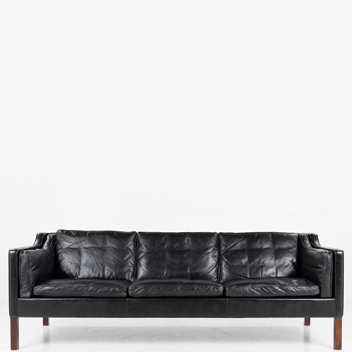 Børge Mogensen / Fredericia Furniture
BM 2213 - 3-seater sofa in original black leather with legs in dark stained 
teak.
1 pc. in stock
Good, used condition

