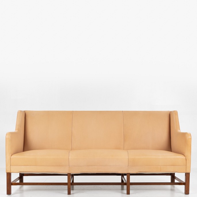 Kaare Klint / Rud Rasmussen Snedkerier
KK 5011 - 3-seater sofa in mahogany and patinated niger leather. Designed in 
1935.
1 pc. in stock
Good condition
